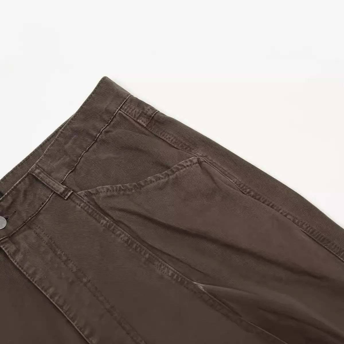 Men's brown straight leg cotton jeans with high waist and zipper fly closure