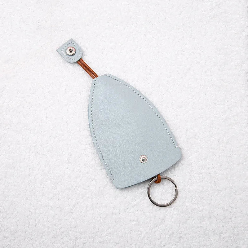 Colourful cartoon pull-out key case made from PU leather, showing the key extended from its protective sleeve.