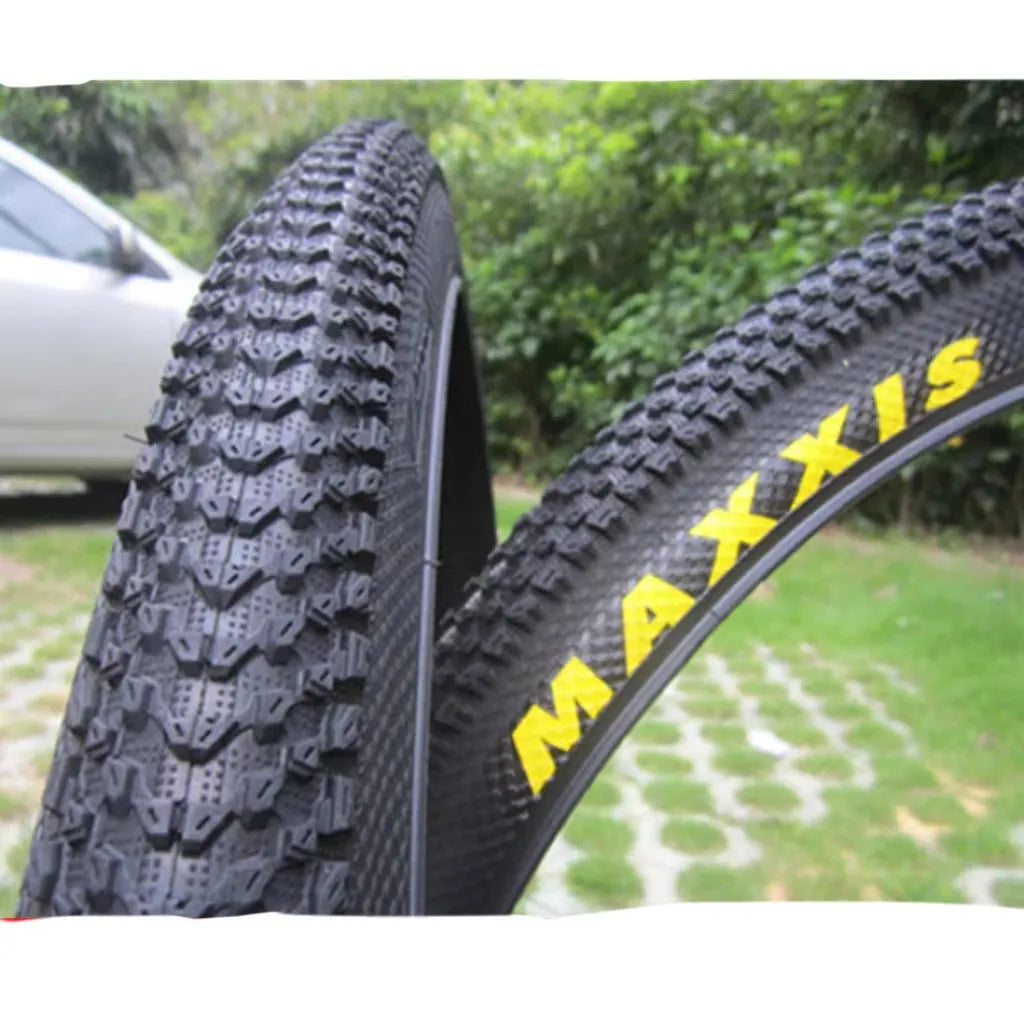 Ultralight mountain bike tyre with reinforced sidewall, shown in a 29x2.1 size with white label.