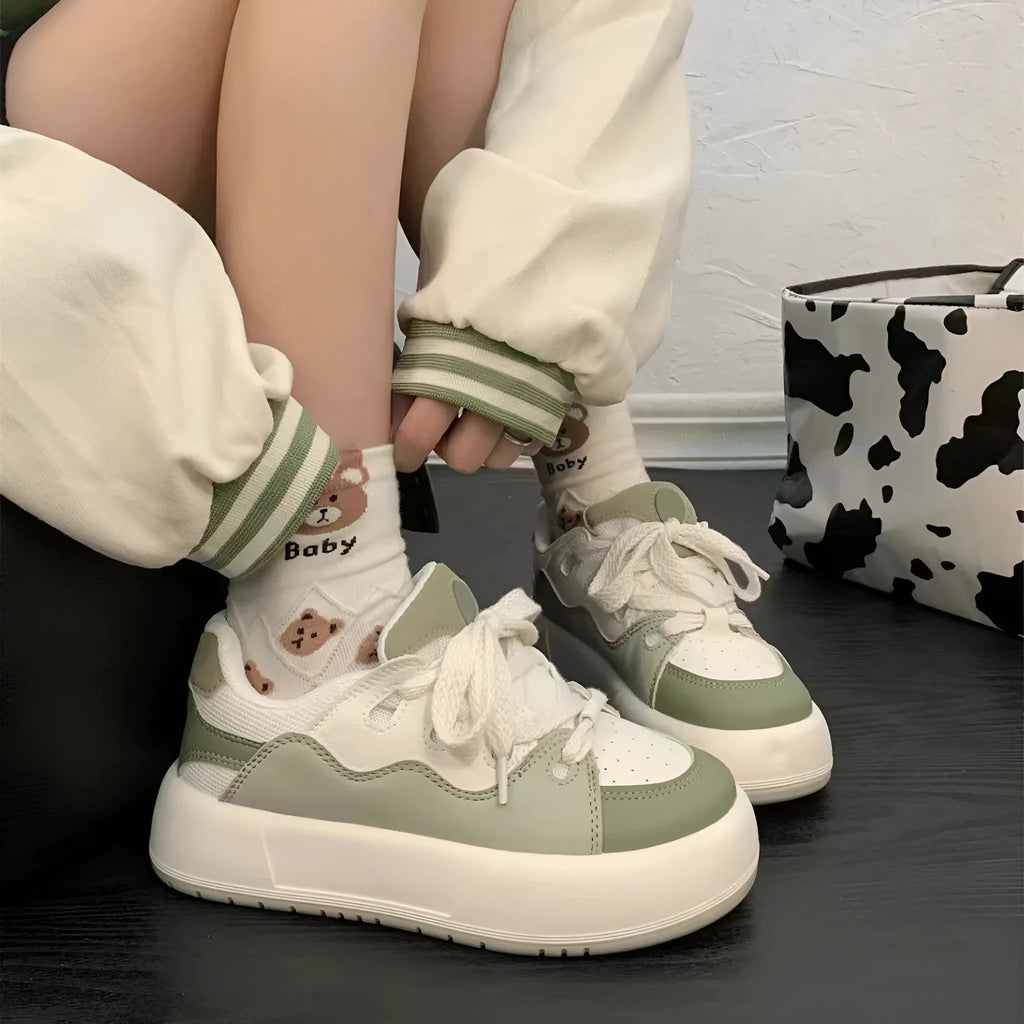 Green women's casual shoes with PU mesh upper, flat heel, and round toe.