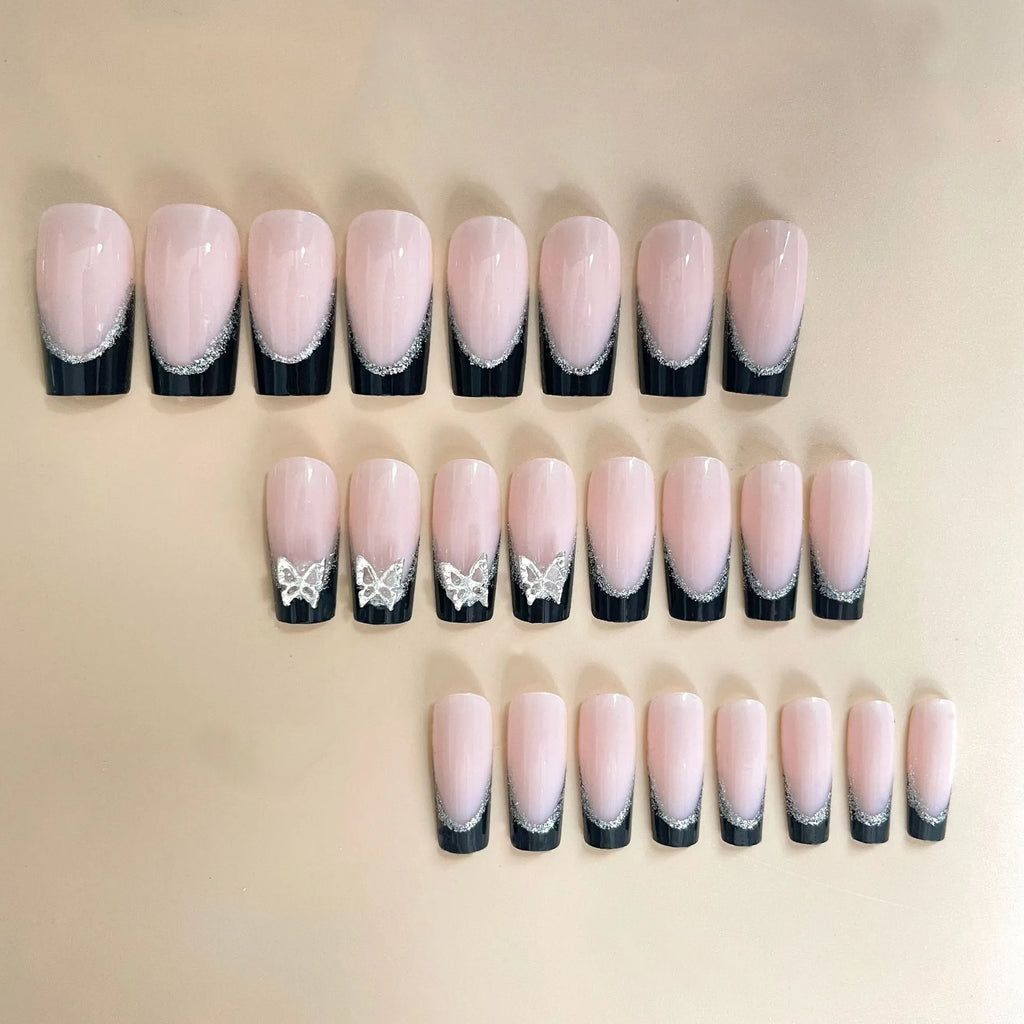 Black French style false nails with glittering butterfly pattern in medium length