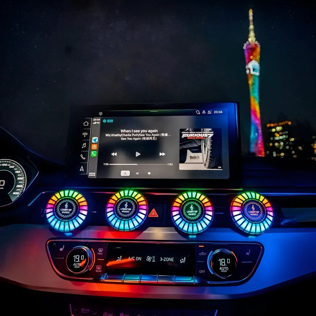 Car air vent aromatherapy unit with colourful RGB lights and a 3D vent clip attachment.