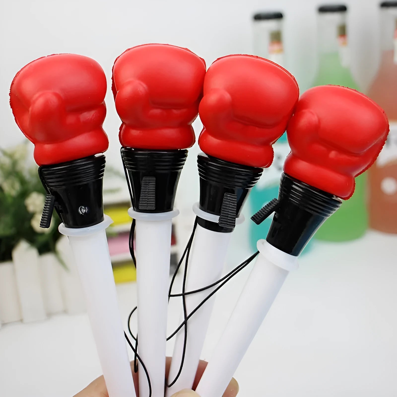 Four black ink pressure relief pens with boxing ejection mechanism and 0.7mm bullet-shaped tips