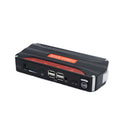 Black and red 12V vehicle emergency jump starter power supply unit on a white background.