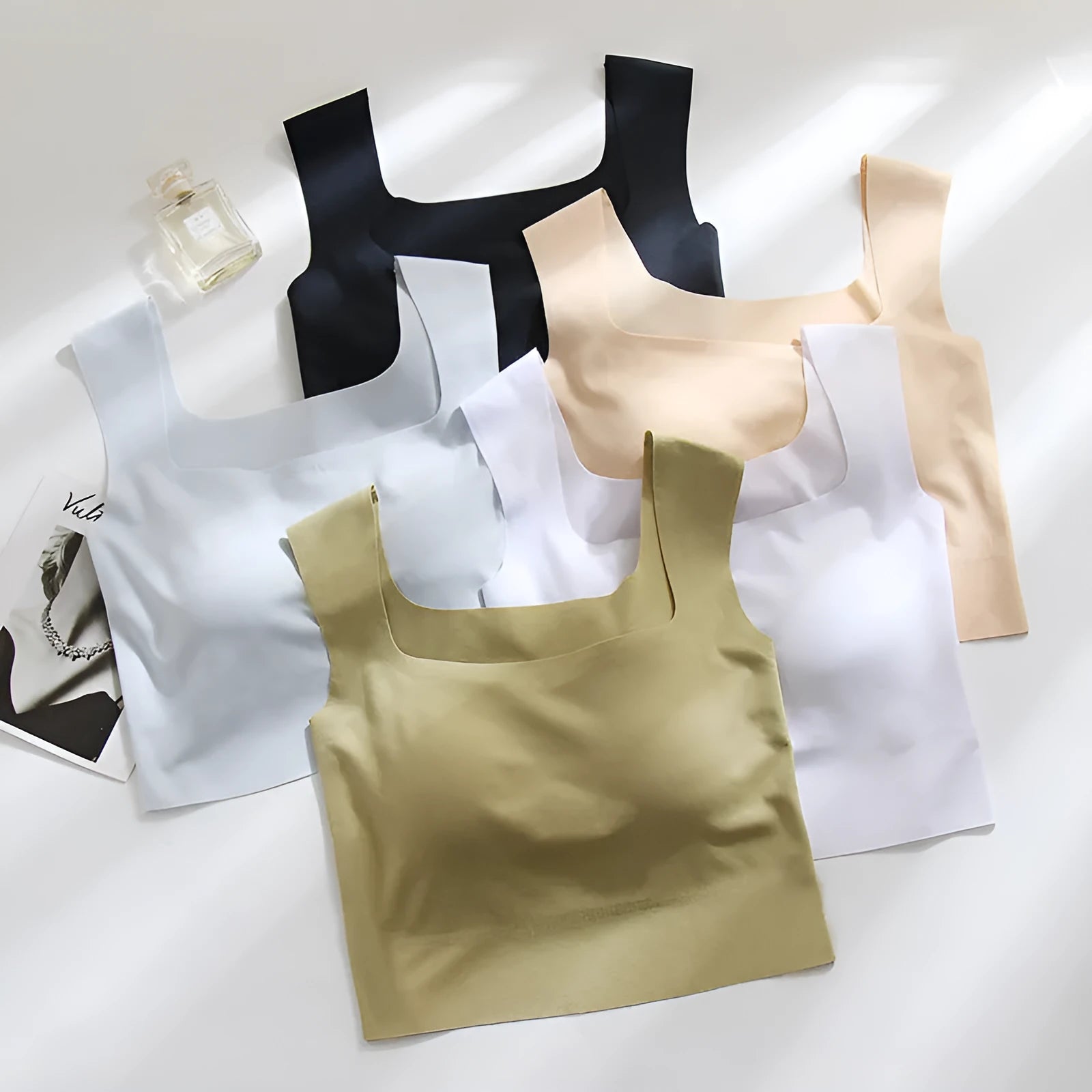 Women's nylon sling vest with non-marking cup and chest pad in light blue.