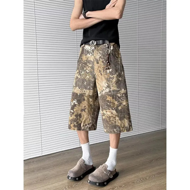 Yellow cotton denim cropped jeans with a snake camouflage pattern print.