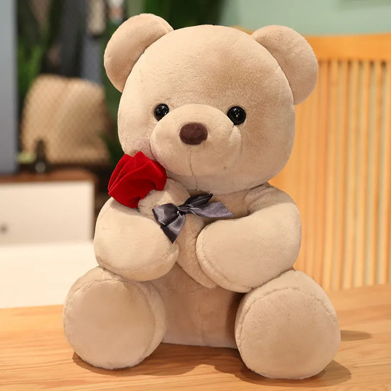 Rose bear plush toy in beige, brown, or grey, shown in sizes from 23cm to 45cm.