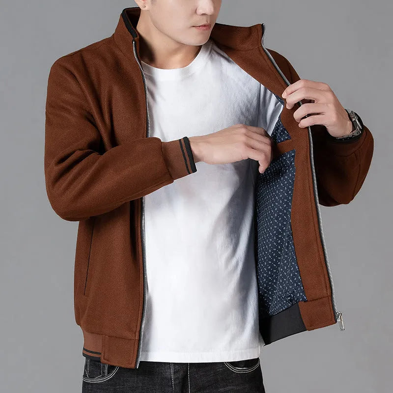 Men's grey woolen fleece sports jacket with long sleeves and a size stick pocket.