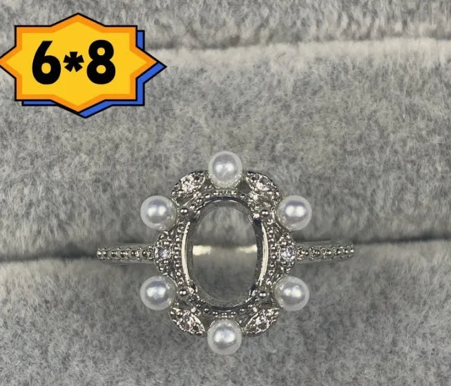 Oval denier ring with open mouth design, 6x8 main stone, and five-pointed star motif in electroplated copper