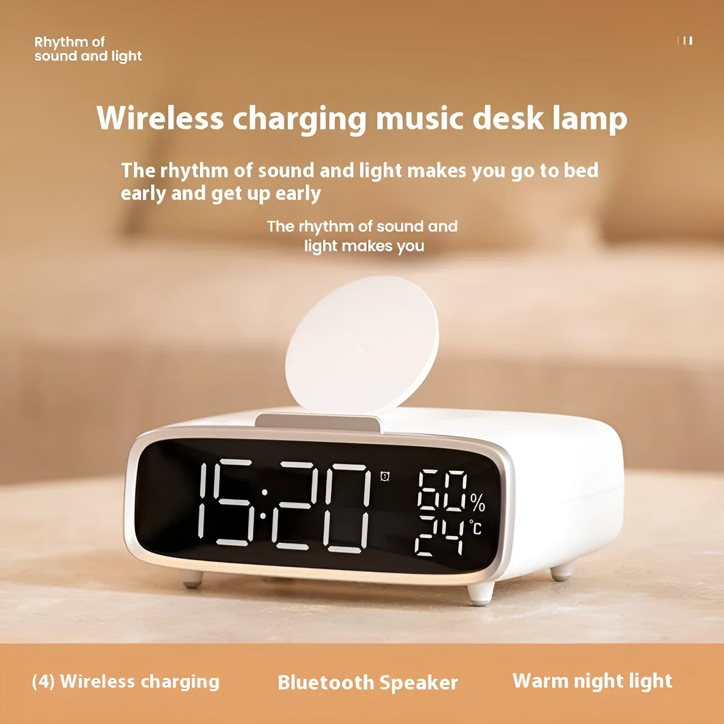 White Bluetooth speaker with wireless charging pad and integrated night lamp