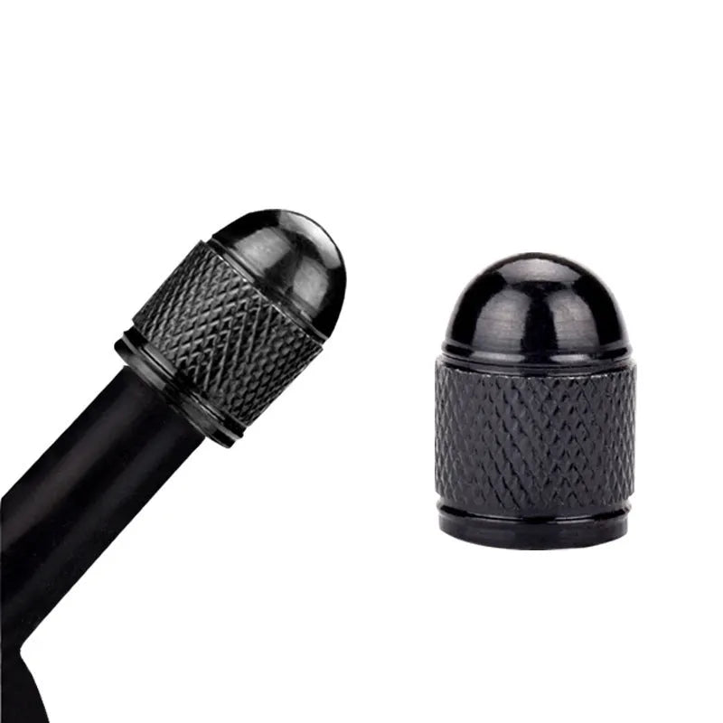 Set of aluminium alloy tyre valve caps for mountain bikes in black, blue, gold, silver, and red colours.