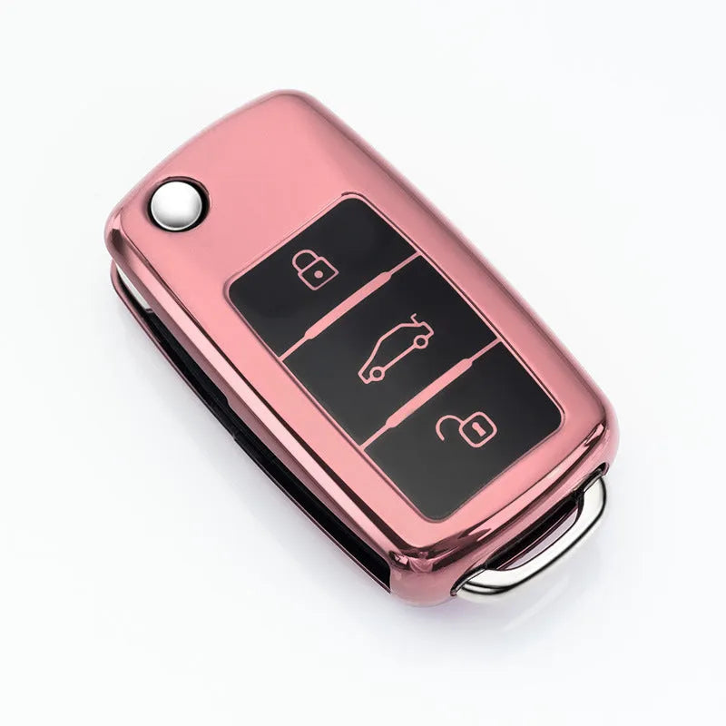 Volkswagen Model A folding key case in TPU material showing four colour options: silver, blue, pink, and red