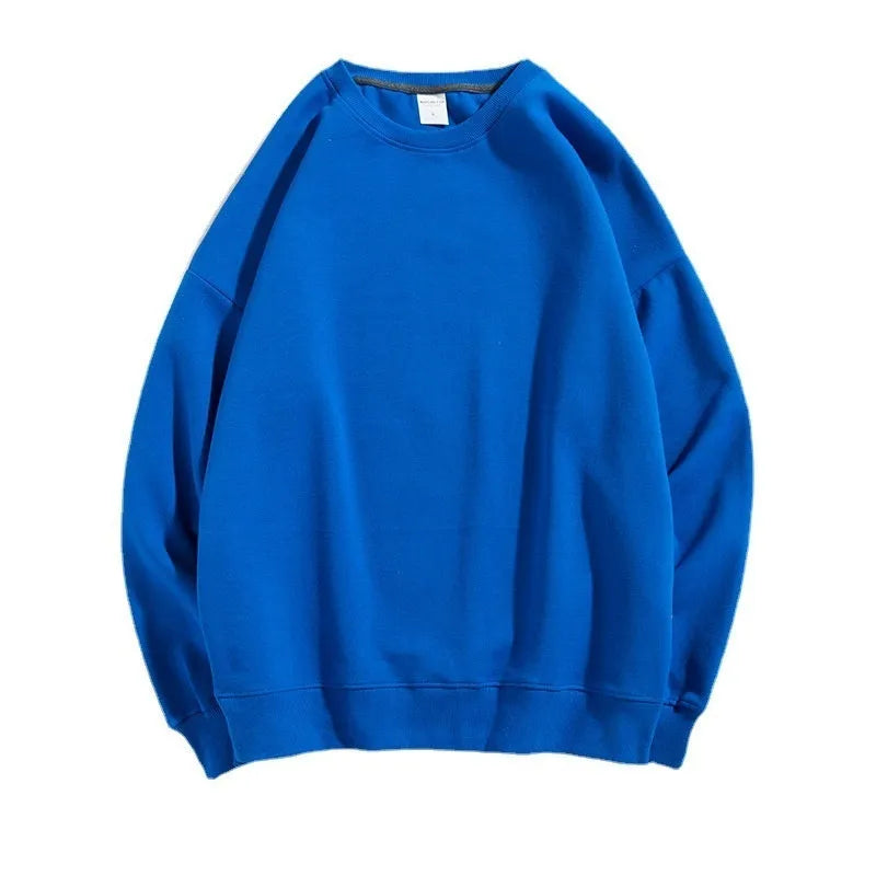 Women's loose fit off-the-shoulder cotton sweater in a solid colour, showing round neck and long sleeves.