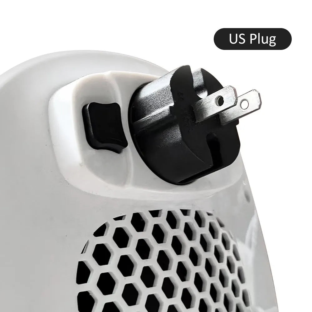 White ceramic heating electric hot air blower heater with remote control on a desk
