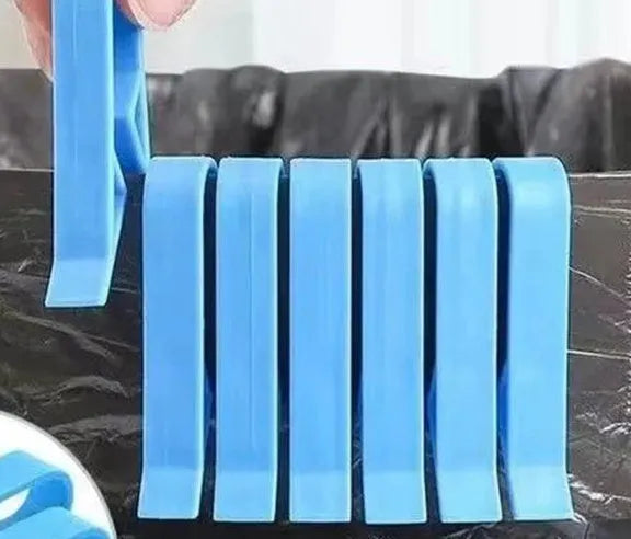 PP plastic non-slip clip for securing rubbish bags to the side of a bin.