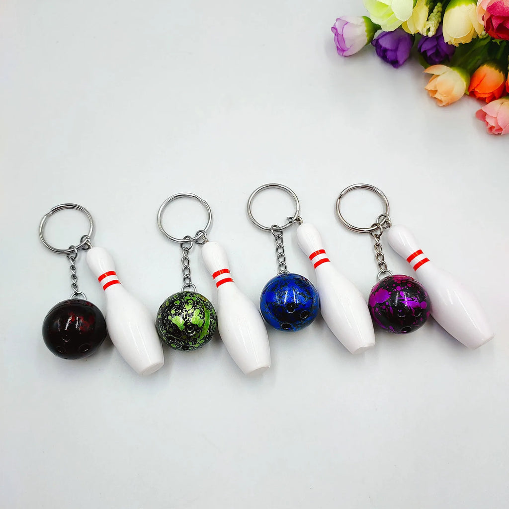 Miniature bowling ball keychain pendant in choice of four colours with key ring attachment