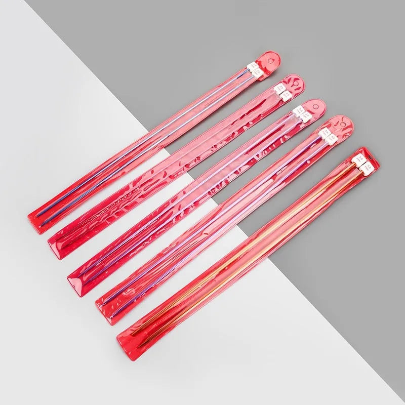 Set of lengthened double-ended crochet hooks in various sizes from 2.0mm to 10.0mm with protective end caps.