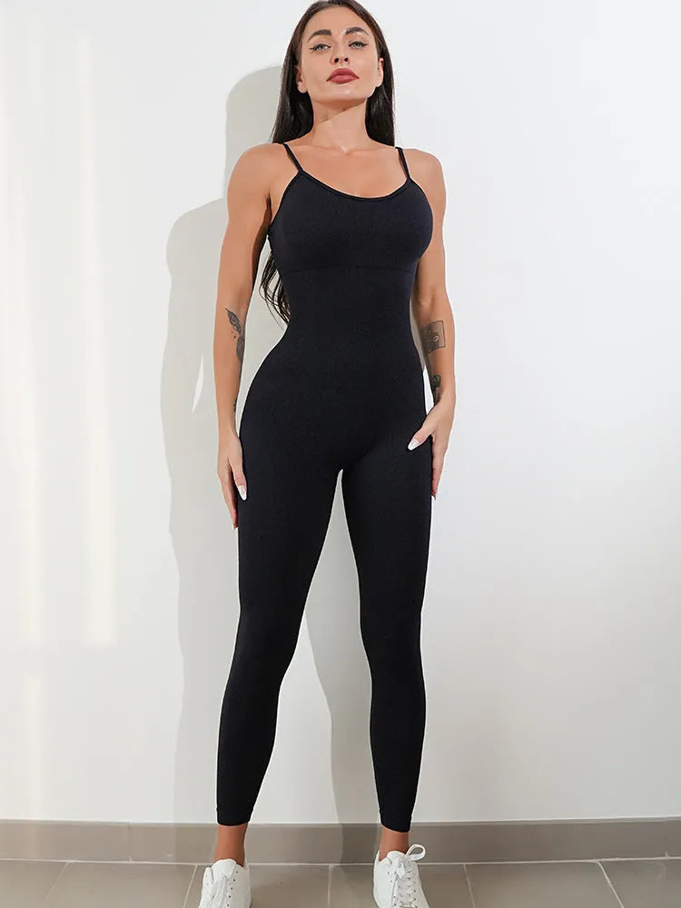 Black women's sleeveless jumpsuit with spaghetti straps and a tight-fitting, long cut.