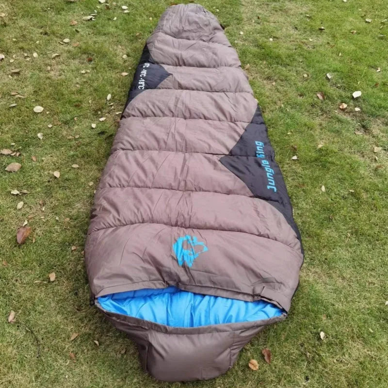 Cotton camping sleeping bag with compression sack in Army Green colour.