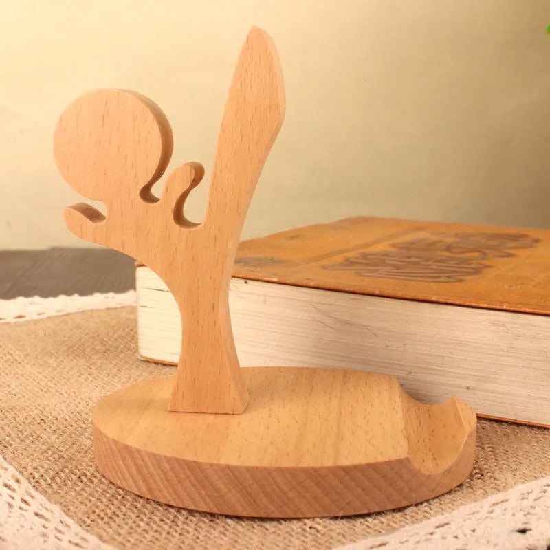Beech wood mobile phone holder with resin animal decoration and custom lettering on coin back.