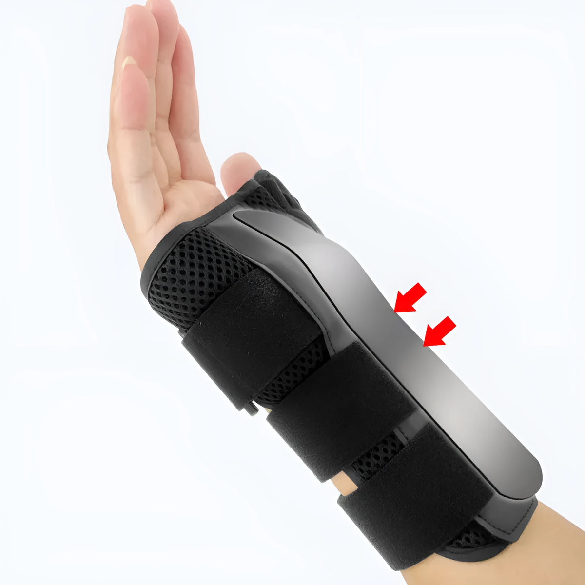 Black and grey carbon fibre sports wrist guard with thumb strap shown on a hand.