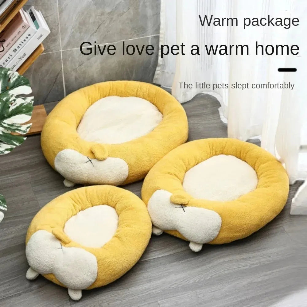 Brown and white corgi-shaped plush pet bed for dogs or cats on a wooden floor.