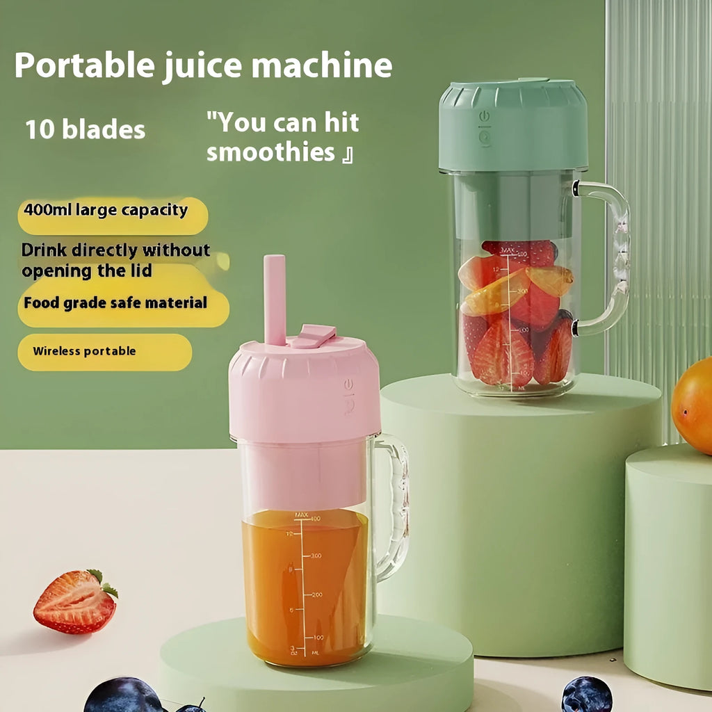 Portable mini juicer in avocado green with USB cable and multiple blade options.