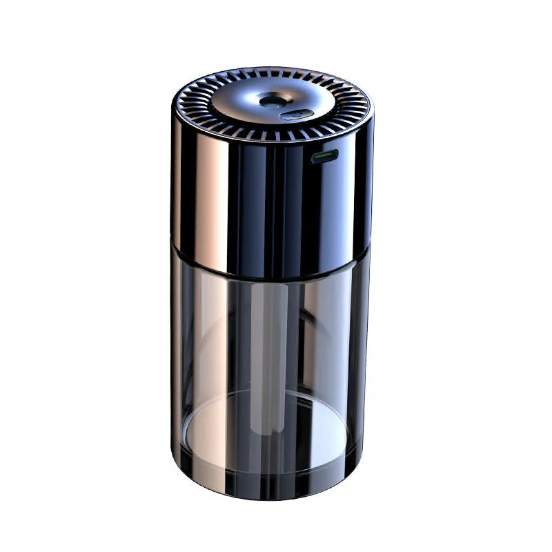 Glass intelligent spray perfume humidifier with USB cable and scent bottle on a desk