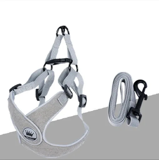Adjustable dog harness in breathable mesh with reflective chest strap and metal control ring