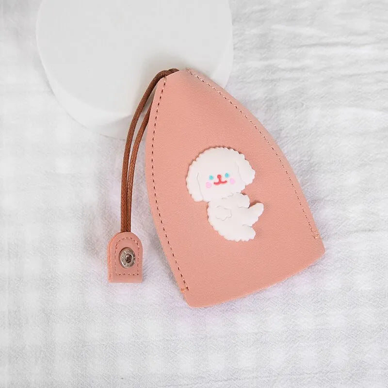 Colourful cartoon pull-out key case made from PU leather, showing the key extended from its protective sleeve.