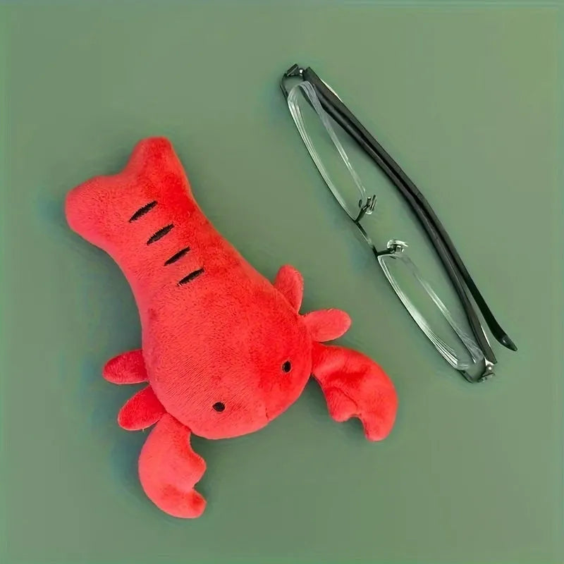 Red lobster shaped squeaky dog toy with crab claw details for small medium dogs