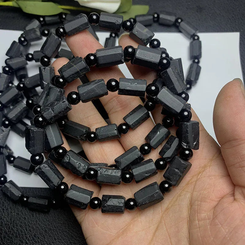 Black tourmaline rough stone bracelet with 8.5-9mm beads and Seiko treatment