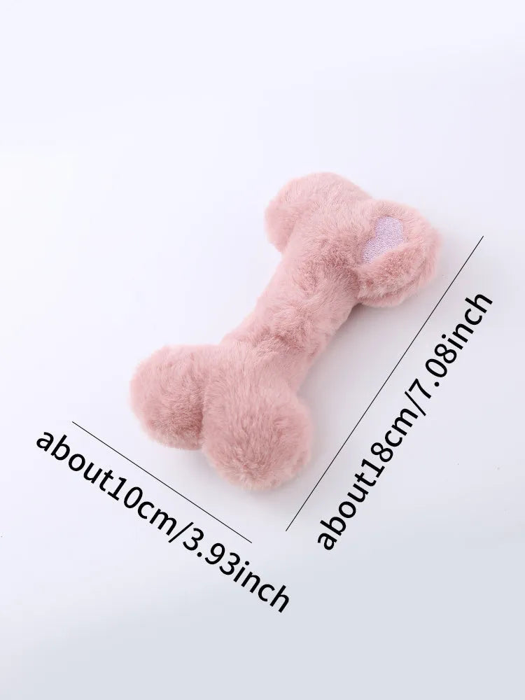 Blue, pink and yellow bone-shaped plush dog toys with squeaker for interactive play