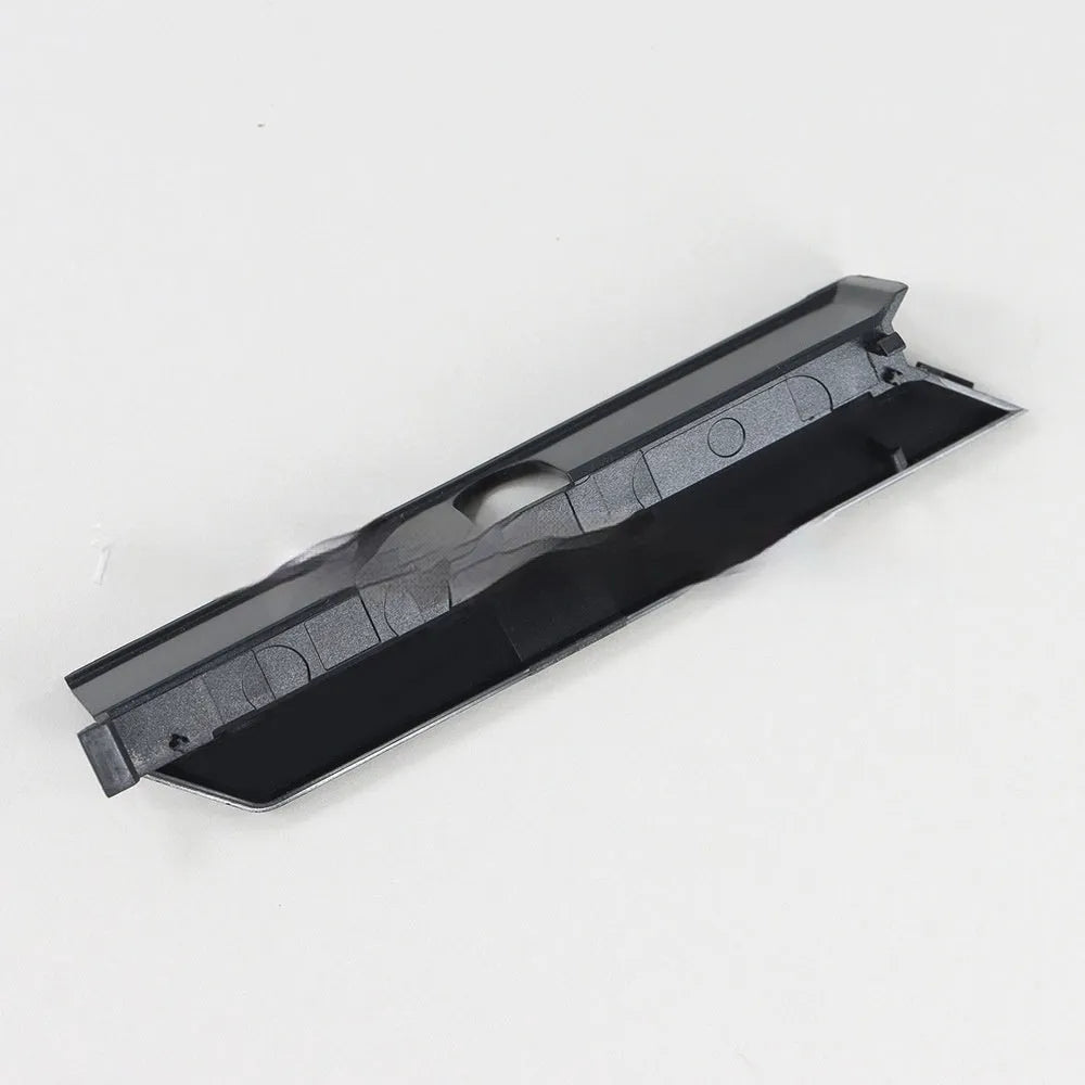 Black and white plastic hard drive baffle cover for internal mounting