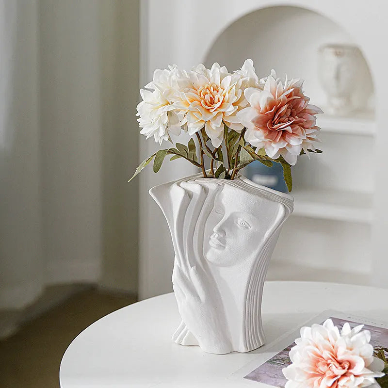Glazed ceramic book stand in a modern simple style on a desk.