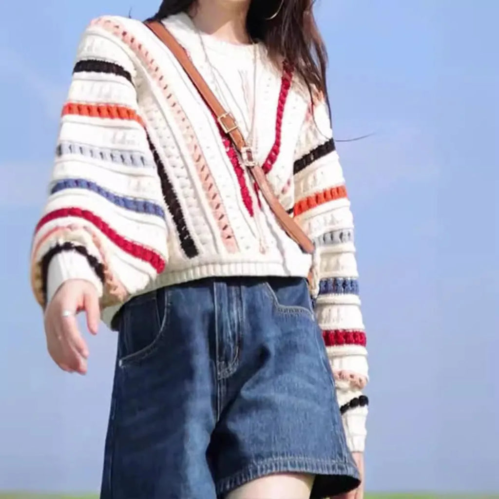 Rainbow striped loose pullover sweater with hollow knit texture and batwing sleeves