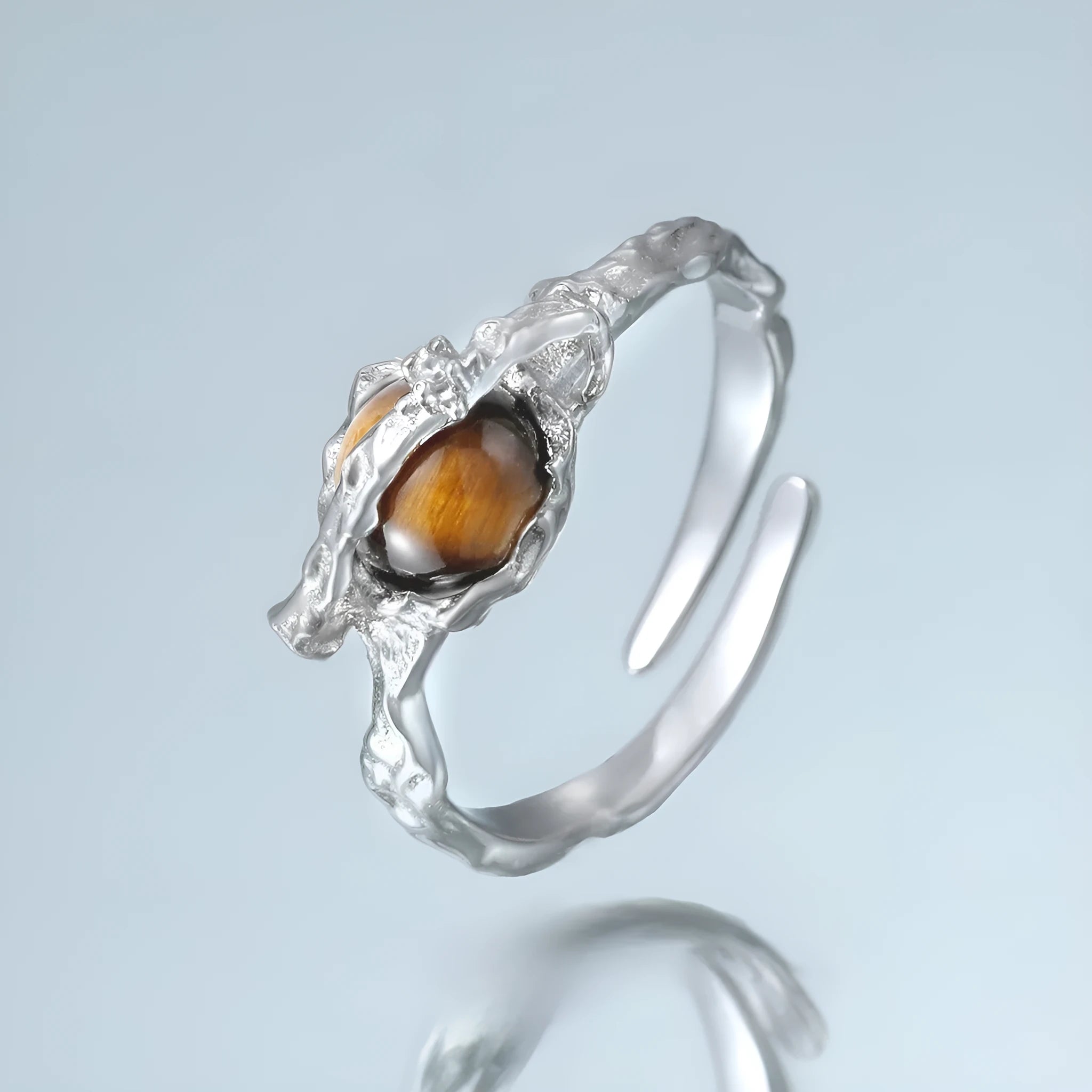 Saturn design adjustable silver open ring with white gold electroplating and tigereye pattern