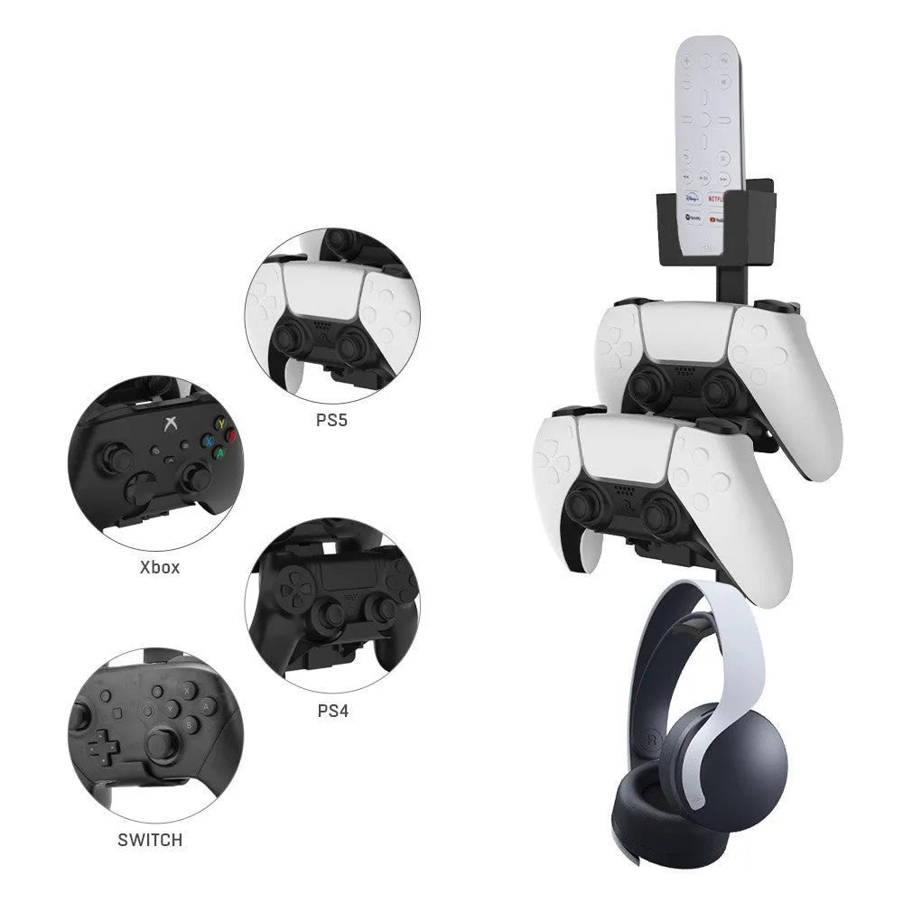 White wall-mounted hook holding PlayStation controller and headset