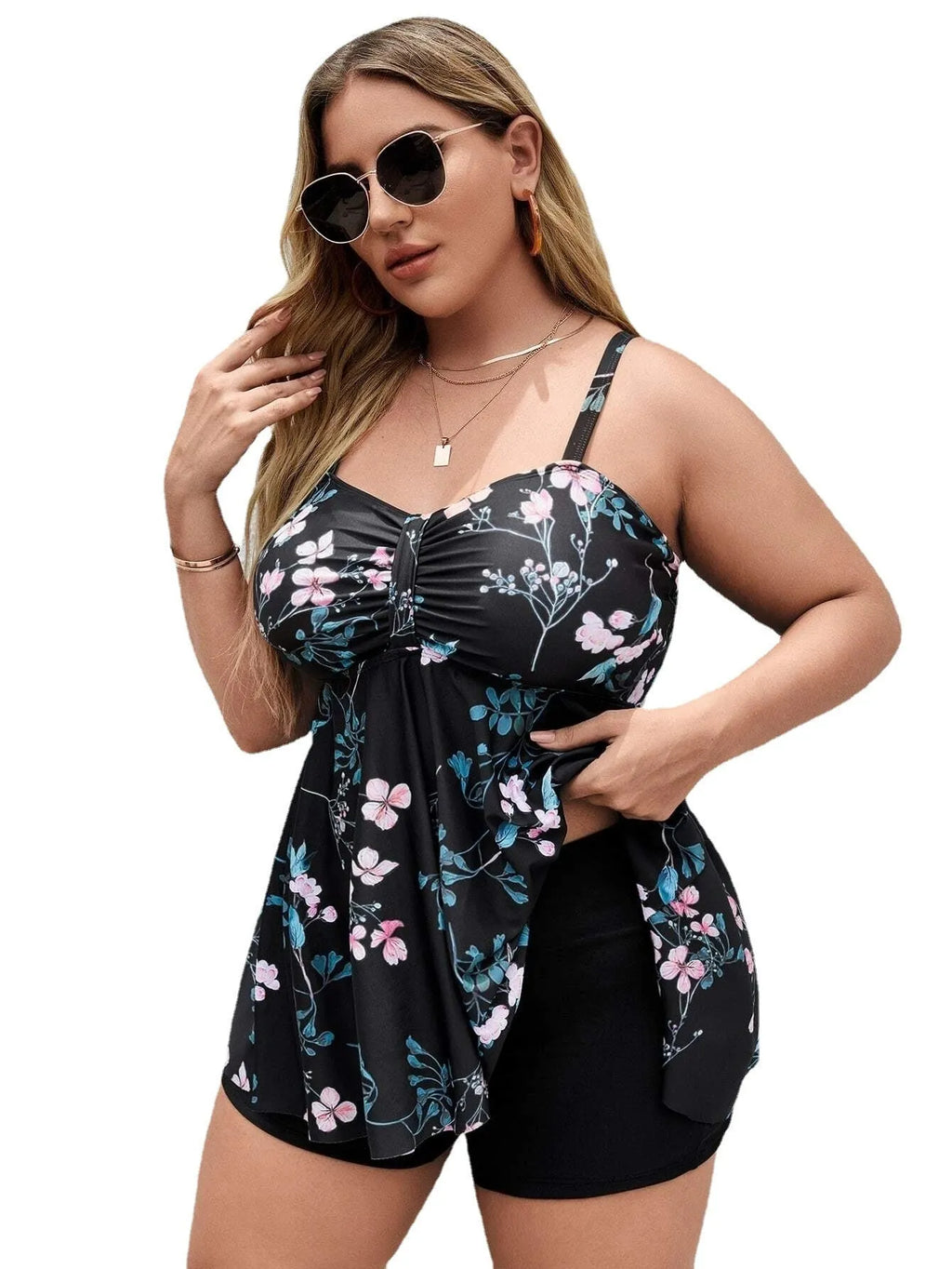 Women's floral print one-piece swimsuit with split-colour design in extended sizes from 0XL to 4XL.