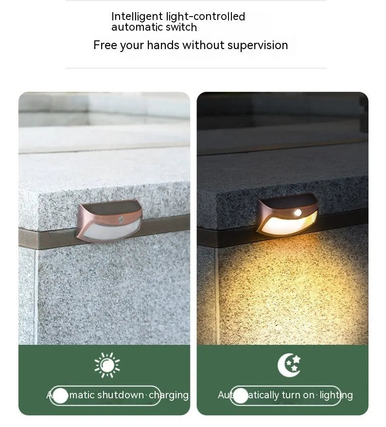 Solar outdoor wall lamp with smiling face design for garden and courtyard lighting