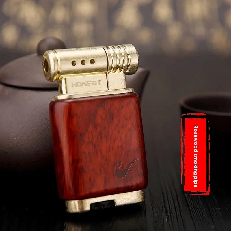 Ebony gas lighter showing four wooden design variations: Black Wood, Rosewood Sun Surface, Rosewood Good Luck and Red Wood Tube