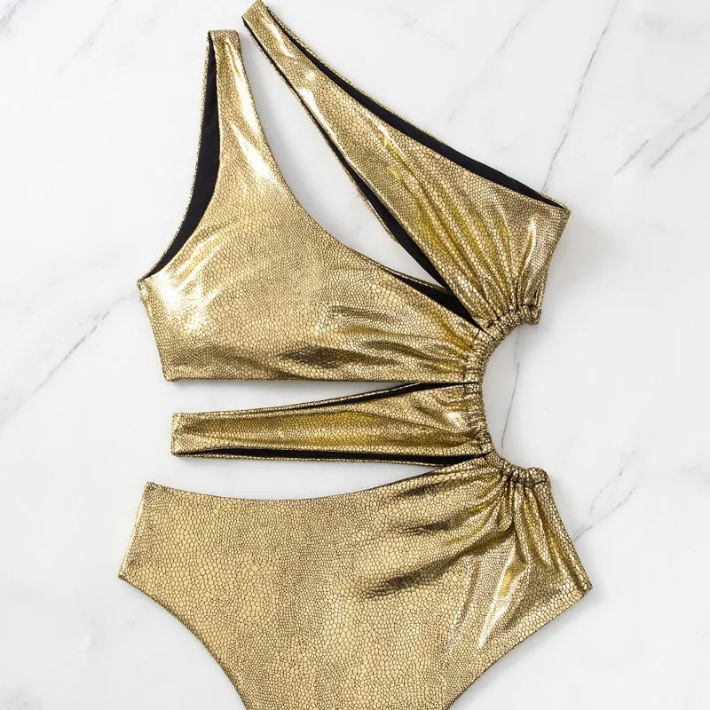 Women's gold one-piece swimsuit with backless design and high elasticity for swimming