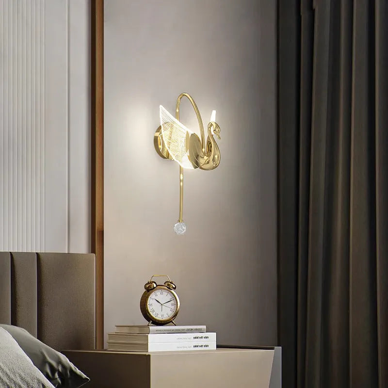 Gold modern minimalist swan LED wall lamp with acrylic shade offering tricolor dimming