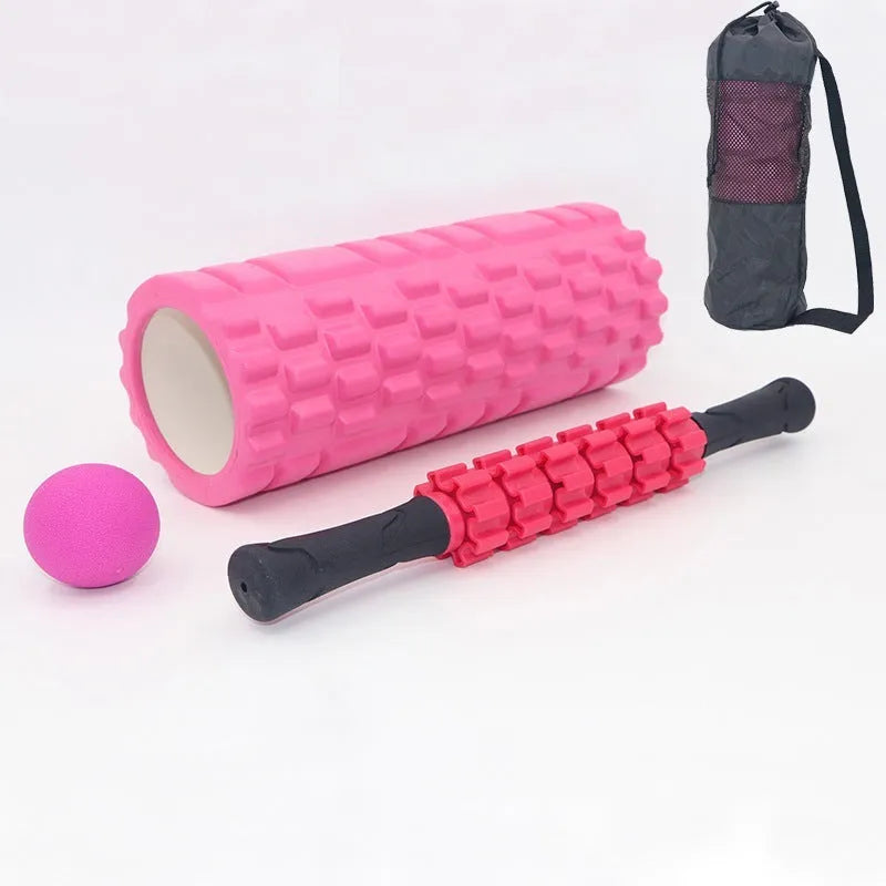 Black 33cm long fitness foam roller with six segmented pieces on a plain background.