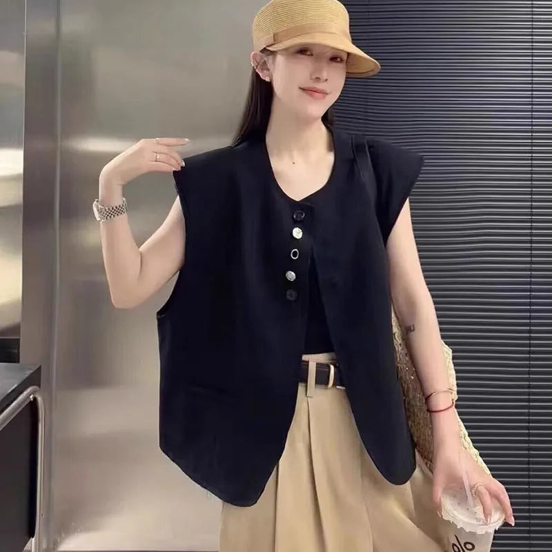 Women's loose-fitting polyester vest with side pockets in milky white colour