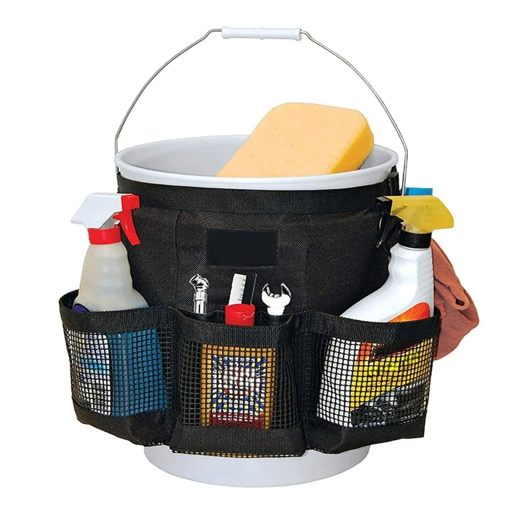 Black cylindrical polyester storage bag hanging on a 5-gallon water barrel for organising tools and gear.
