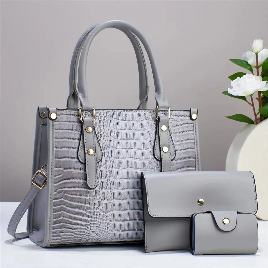 PU leather crossbody bag three-piece set showing bucket bag, wallet and card holder in coordinating colour