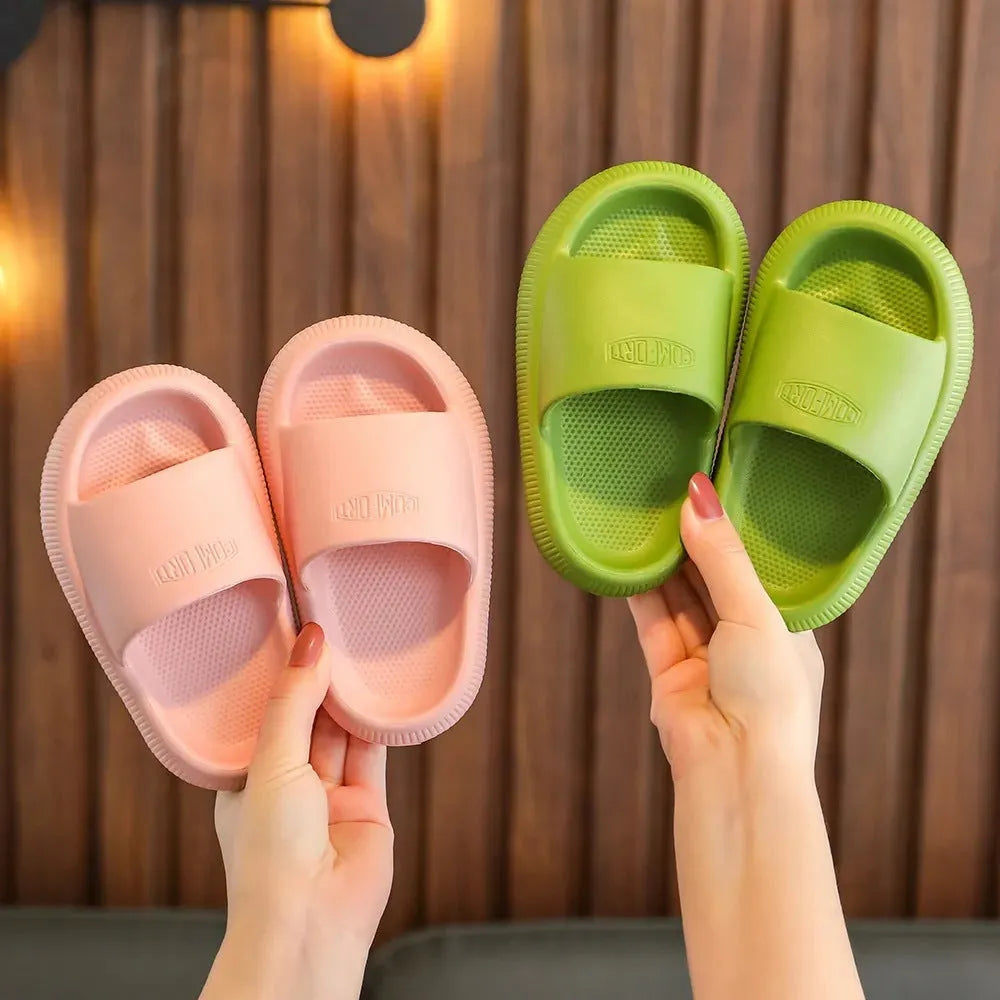 Brightly coloured children's EVA slippers with a textured non-slip sole, shown in multiple colour options.