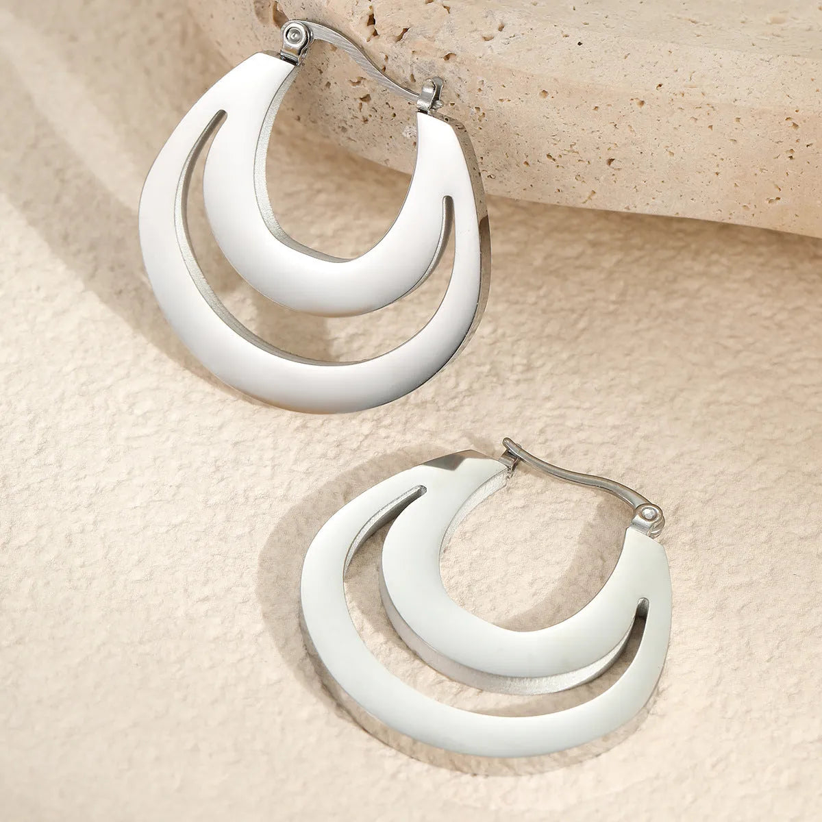 Gold plated geometric French earrings with round ring minimalist design