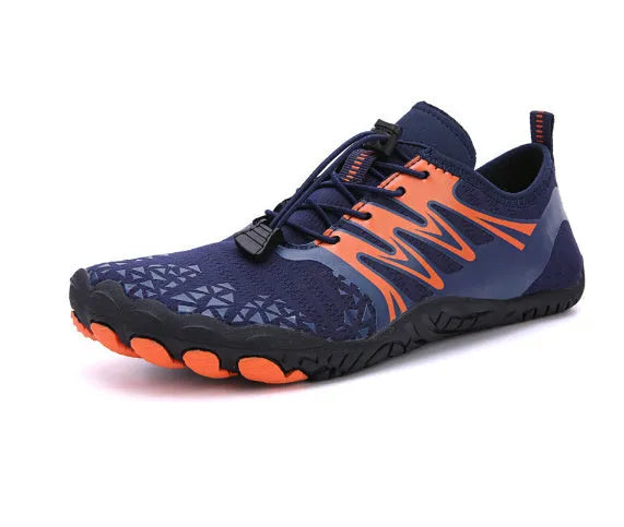 White and pink lace-up sports shoes with rubber sole on a plain background
